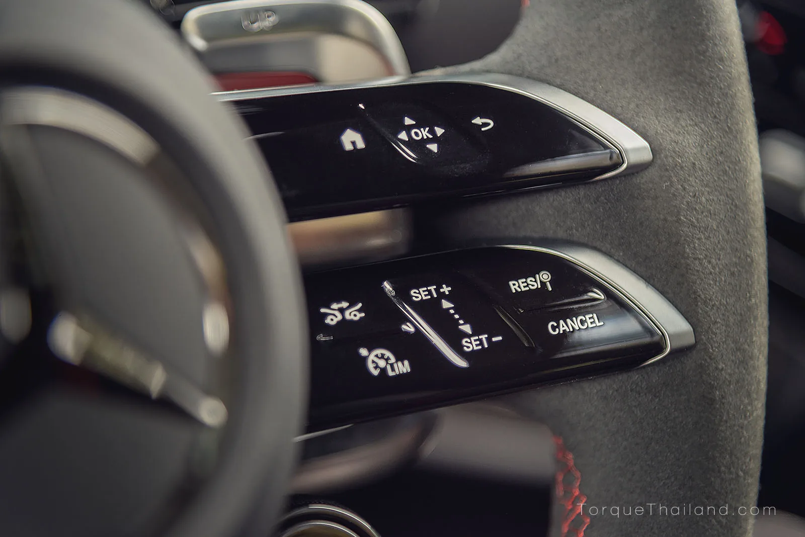 ชุดควบคุมระบบสัมผัสแบบ Haptic บนก้านพวงมาลัยสำหรับการสั่งการระบบ ACC และการควบคุมทิศทางที่อาจมีการตอบสนองไม่สม่ำเสมอ