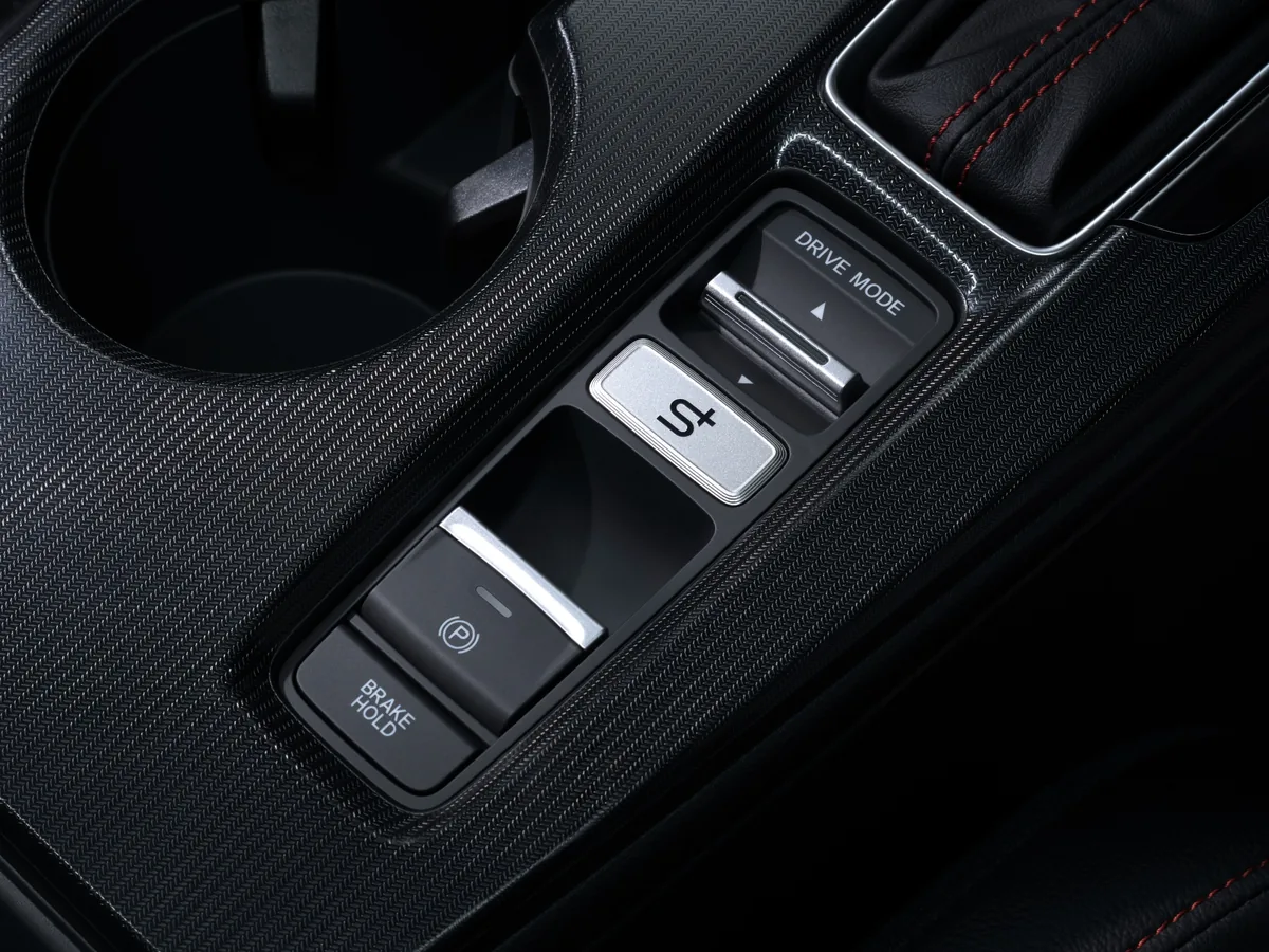 ปุ่ม Honda S+ Shift ใน Honda Civic e:HEV RS ปุ่ม Honda S+ Shift บริเวณคอนโซลกลางของ Honda Civic e:HEV RS
