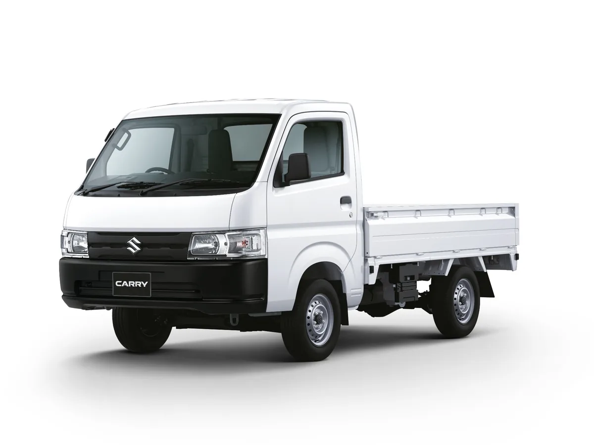 Suzuki Carry สีขาว มุมมองด้านหน้าด้านข้าง Suzuki Carry สีขาว มุมมองด้านหน้าค่อนไปทางด้านข้าง